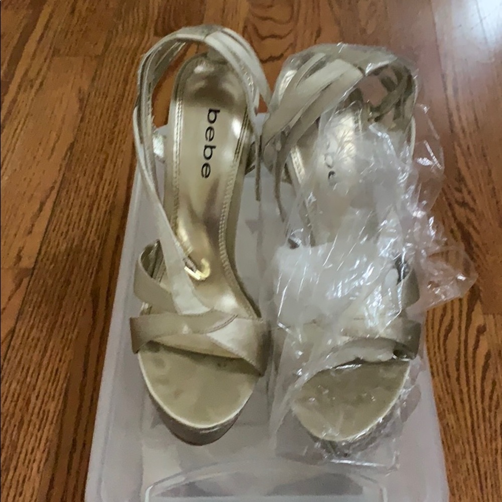 Bebe Champagne snake platform size 7